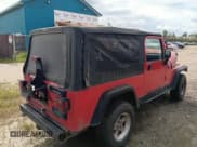 ✅ 2005 Jeep Wrangler Unlimited • VIN: 1J4FA44S15P312587 • Lot: 68176985. Listed on Copart with 186,612 mi. Free auction sales archive from the USA and detailed vehicle history report at DreamBid. Image 3.