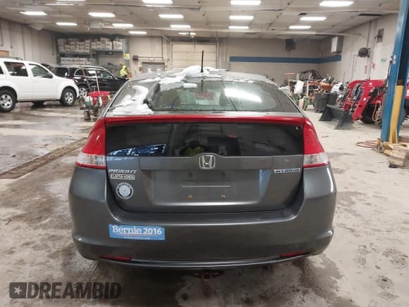 ✅ 2010 Honda Insight LX • VIN: JHMZE2H58AS038570 • Lot: 43848401. Listed on IAAI with 158,775 mi. Free auction sales archive from the USA and detailed vehicle history report at DreamBid. Image 15.
