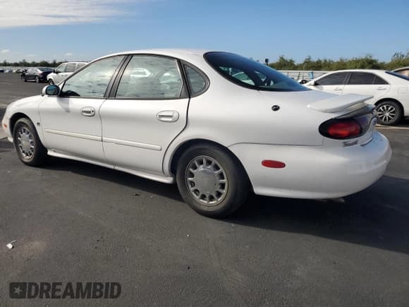 ✅ 1998 Ford Taurus SE Comfort • VIN: 1FAFP53S3WA246260 • Лот: 91224205. Опубликован ранее на Copart с пробегом 167 263 миль. Бесплатный доступ к архиву аукционных продаж из США и подробный отчёт об истории автомобиля на DreamBid. Изображение 2.