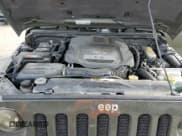 ✅ 2015 Jeep Wrangler Unlimited Sahara • VIN: 1C4BJWEG0FL571719 • Lot: 81011165. Listed on Copart with 107,108 mi. Free auction sales archive from the USA and detailed vehicle history report at DreamBid. Image 11.