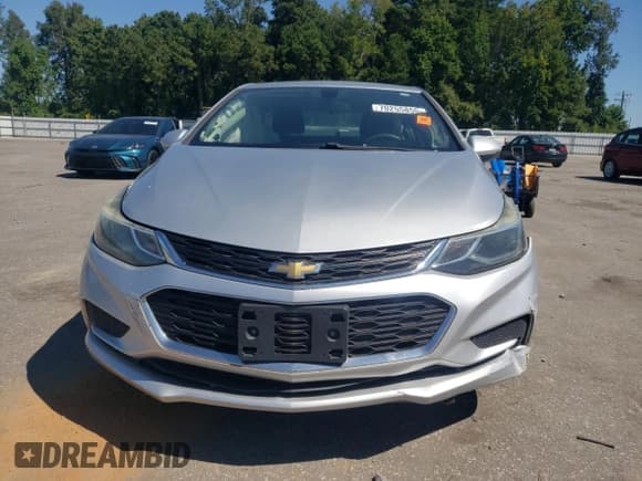 ✅ 2017 Chevrolet Cruze LT • VIN: 1G1BE5SM4H7223824 • Lot: 81200345. Wystawiony na Copart z przebiegiem 128 974 mil. Bezpłatny archiwum sprzedaży aukcyjnych z USA i szczegółowy raport historii pojazdu na DreamBid. Zdjęcie 5.
