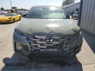 2022 Hyundai Santa Cruz SEL z VIN 5NTJB4AE1NH007406, wystawiony jako Copart lot #75457224 z przebiegiem 23 725 mil mil oraz Szkoda całkowita • Salvage title. Historia ofert i sprzedaży dostępna na DreamBid. Obrazek 5.