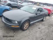 ✅ 2007 Ford Mustang Deluxe • VIN: 1ZVFT80NX75211227 • Lot: 42412832. Listed on IAAI with 166,297 mi. Free auction sales archive from the USA and detailed vehicle history report at DreamBid. Image 2.