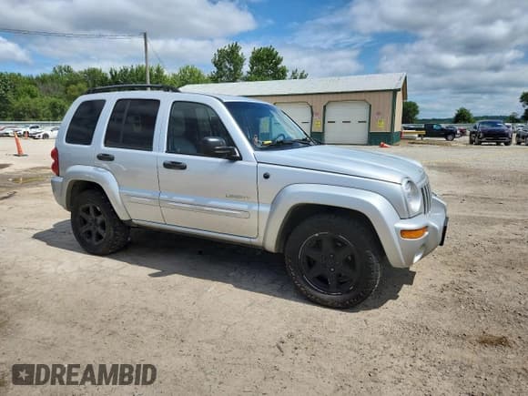 ✅ 2004 Jeep Liberty Limited • VIN: 1J4GL58K44W132894 • Lot: 69481155. Listed on Copart with 155,269 mi. Free auction sales archive from the USA and detailed vehicle history report at DreamBid. Image 4.