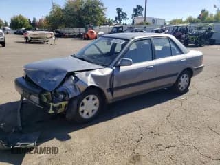 ✅ 1991 Mazda Protege • VIN: JM1BG2266M0290803 • Lot: 81856185. Wystawiony na Copart z przebiegiem 168 620 mil. Bezpłatny archiwum sprzedaży aukcyjnych z USA i szczegółowy raport historii pojazdu na DreamBid. Zdjęcie 1.