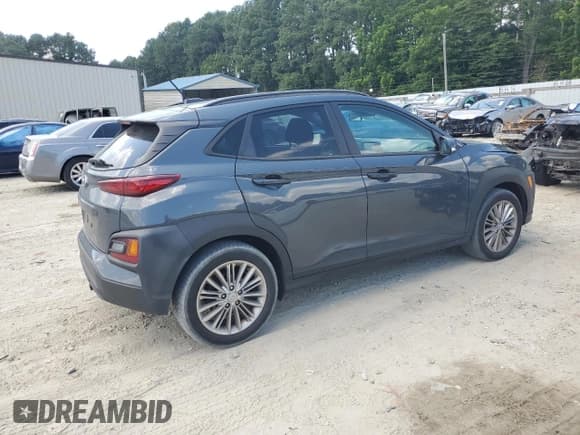 ✅ 2021 Hyundai Kona SEL • VIN: KM8K22AA1MU670351 • Лот: 65957645. Опубликован ранее на Copart с пробегом 127 312 миль. Бесплатный доступ к архиву аукционных продаж из США и подробный отчёт об истории автомобиля на DreamBid. Изображение 3.