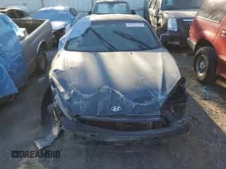 ✅ 2007 Hyundai Tiburon GT • VIN: KMHHN66F67U244091 • Лот: 68401725. Опубликован ранее на Copart с пробегом Не указан. Бесплатный доступ к архиву аукционных продаж из США и подробный отчёт об истории автомобиля на DreamBid. Изображение 5.
