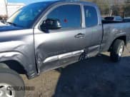 ✅ 2021 Toyota Tacoma SR • VIN: 3TYRX5GN1MT032707 • Lot: 41084101. Listed on IAAI with 39,040 mi. Free auction sales archive from the USA and detailed vehicle history report at DreamBid. Image 6.