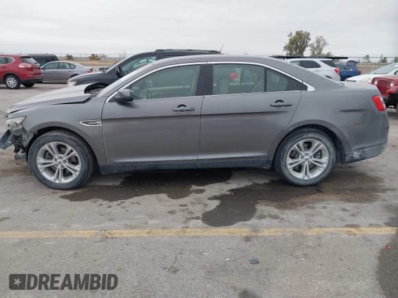 ✅ 2013 Ford Taurus SEL • VIN: 1FAHP2H80DG156174 • Лот: 43511130. Опубликован ранее на IAAI с пробегом 162 292 миль. Бесплатный доступ к архиву аукционных продаж из США и подробный отчёт об истории автомобиля на DreamBid. Изображение 14.