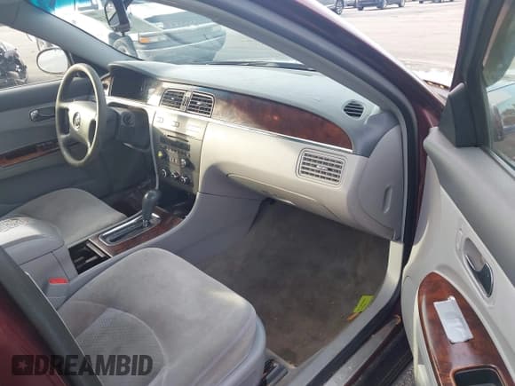 ✅ 2007 Buick LaCrosse CX • VIN: 2G4WC582671135241 • Lot: 43763610. Wystawiony na IAAI z przebiegiem 192 384 mil. Bezpłatny archiwum sprzedaży aukcyjnych z USA i szczegółowy raport historii pojazdu na DreamBid. Zdjęcie 5.