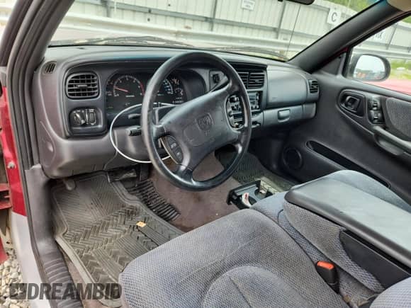 1999 Dodge Dakota SLT z VIN 1B7GL22YXXS153424, wystawiony jako Copart lot #63814205 z przebiegiem 165 405 mil mil oraz Szkoda całkowita • Salvage title. Historia ofert i sprzedaży dostępna na DreamBid. Obrazek 8.