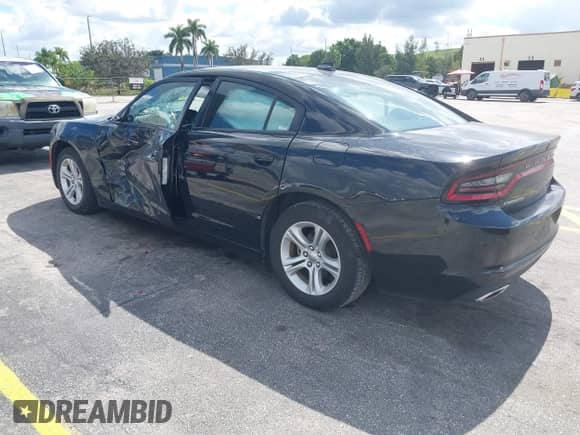 2023 Dodge Charger SXT z VIN 2C3CDXBG8PH551730, wystawiony jako IAAI lot #43507351 z przebiegiem 52 150 mil mil oraz . Historia ofert i sprzedaży dostępna na DreamBid. Obrazek 3.