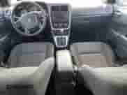 2011 Dodge Caliber Mainstreet with VIN 1B3CB3HA3BD123701, listed as a Copart auction lot 90858485 with 172,631 mi miles and Salvage title. Bid and sale history available at DreamBid. Image 8.