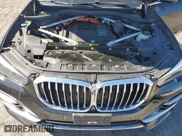 ✅ 2023 BMW X5 xDrive45e • VIN: 5UXTA6C03P9N92460 • Лот: 87025515. Опубликован ранее на Copart с пробегом 65 068 миль. Бесплатный доступ к архиву аукционных продаж из США и подробный отчёт об истории автомобиля на DreamBid. Изображение 12.