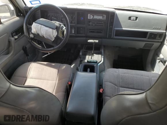 ✅ 1996 Jeep Cherokee Sport • VIN: 1J4FJ68S1TL128597 • Lot: 49600545. Listed on Copart with 201,074 mi. Free auction sales archive from the USA and detailed vehicle history report at DreamBid. Image 8.