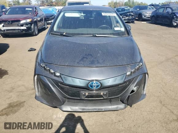 2022 Toyota Prius LE с VIN JTDKAMFP8N3228240, выставлен на аукционе Copart как лот 84977275 с пробегом Не указан миль и Списание • Salvage title. История ставок и продаж доступна на DreamBid. Изображение 5.
