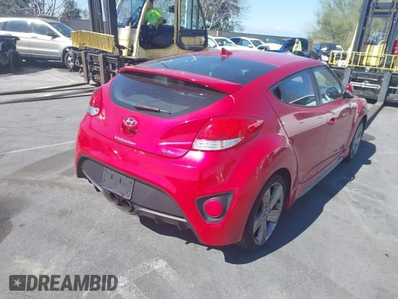 ✅ 2015 Hyundai Veloster Turbo • VIN: KMHTC6AE2FU222697 • Lot: 41511550. Wystawiony na IAAI z przebiegiem 109 156 mil. Bezpłatny archiwum sprzedaży aukcyjnych z USA i szczegółowy raport historii pojazdu na DreamBid. Zdjęcie 4.