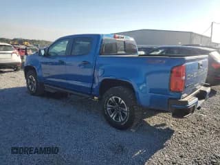 ✅ 2022 Chevrolet Colorado 4WD Z71 • VIN: 1GCGTDENXN1147977 • Лот: 75995264. Опубликован ранее на Copart с пробегом 26 184 миль. Бесплатный доступ к архиву аукционных продаж из США и подробный отчёт об истории автомобиля на DreamBid. Изображение 2.