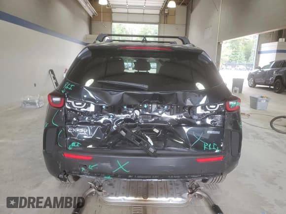 ✅ 2025 Mazda CX-50 Hybrid Premium Package • VIN: 7MMVAADW9SN125303 • Lot: 80655325. Listed on Copart with 3,864 mi. Free auction sales archive from the USA and detailed vehicle history report at DreamBid. Image 6.