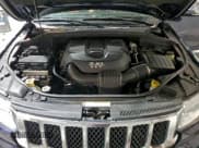 ✅ 2012 Jeep Grand Cherokee Overland • VIN: 1C4RJFCG4CC175211 • Lot: 92904015. Listed on Copart with 145,081 mi. Free auction sales archive from the USA and detailed vehicle history report at DreamBid. Image 12.