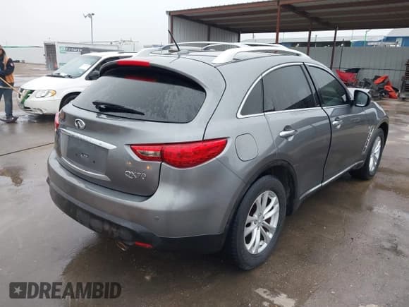 ✅ 2015 Infiniti QX70 • VIN: JN8CS1MUXFM380576 • Lot: 41516132. Wystawiony na IAAI z przebiegiem 109 662 mil. Bezpłatny archiwum sprzedaży aukcyjnych z USA i szczegółowy raport historii pojazdu na DreamBid. Zdjęcie 4.