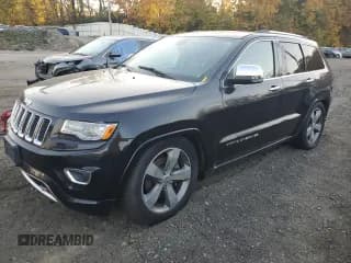 ✅ 2015 Jeep Grand Cherokee Overland • VIN: 1C4RJFCM7FC791589 • Lot: 77454564. Listed on Copart with 128,100 mi. Free auction sales archive from the USA and detailed vehicle history report at DreamBid. Image 1.