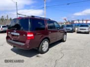 ✅ 2011 Ford Expedition Limited • VIN: 1FMJU2A57BEF10152 • Lot: 54373345. Listed on Copart with 196,959 mi. Free auction sales archive from the USA and detailed vehicle history report at DreamBid. Image 4.