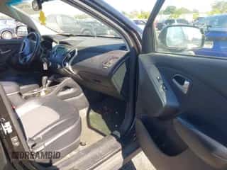 2012 Hyundai Tucson Limited with VIN KM8JUCAC1CU395060, listed as a IAAI auction lot 43257944 with 235,826 mi miles and . Bid and sale history available at DreamBid. Image 5.