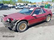 ✅ 1985 Pontiac Fiero • VIN: 1G2PE37R3FP242761 • Lot: 42006726. Listed on IAAI with 221,395 mi. Free auction sales archive from the USA and detailed vehicle history report at DreamBid. Image 2.