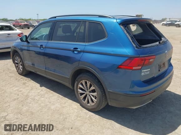 ✅ 2018 Volkswagen Tiguan S • VIN: 3VV0B7AXXJM015331 • Lot: 42012557. Listed on IAAI with 80,288 mi. Free auction sales archive from the USA and detailed vehicle history report at DreamBid. Image 3.