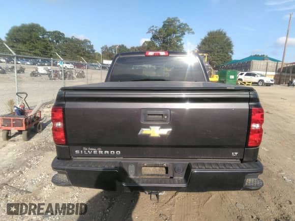 2016 Chevrolet Silverado 1500 LT z VIN 3GCUKREC5GG288672, wystawiony jako IAAI lot #43314900 z przebiegiem 56 245 mil mil oraz . Historia ofert i sprzedaży dostępna na DreamBid. Obrazek 16.