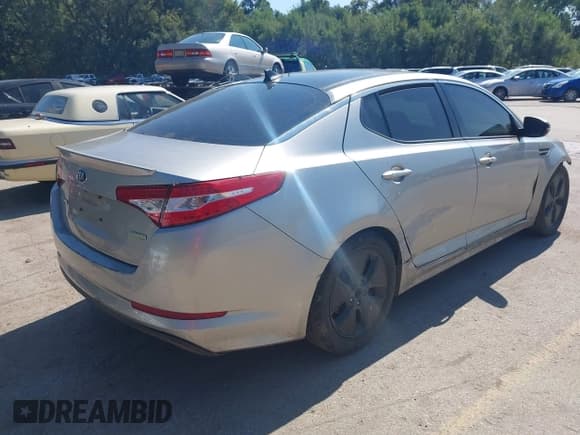 ✅ 2012 Kia Optima Hybrid • VIN: KNAGM4AD7C5031987 • Lot: 43286976. Listed on IAAI with 164,320 mi. Free auction sales archive from the USA and detailed vehicle history report at DreamBid. Image 4.