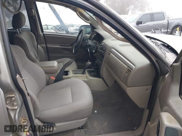 ✅ 2002 Jeep Grand Cherokee • VIN: 1J8GX48S42C147018 • Lot: 43589496. Listed on IAAI with 192,014 mi. Free auction sales archive from the USA and detailed vehicle history report at DreamBid. Image 5.