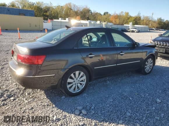 2009 Hyundai Sonata Limited z VIN 5NPEU46C79H545695, wystawiony jako Copart lot #82485375 z przebiegiem 187 737 mil mil oraz Szkoda całkowita • Salvage title. Historia ofert i sprzedaży dostępna na DreamBid. Obrazek 3.