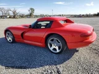 ✅ 2001 Dodge Viper RT/10 • VIN: 1B3ER65E71V700915 • Lot: 79763054. Listed on Copart with 8,082 mi. Free auction sales archive from the USA and detailed vehicle history report at DreamBid. Image 2.