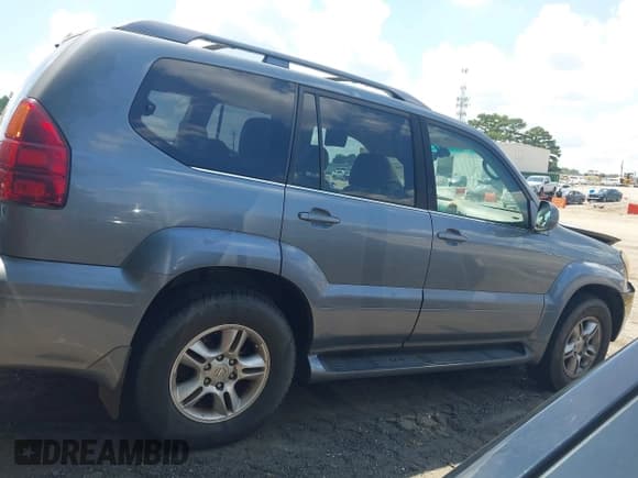 ✅ 2004 Lexus GX 470 • VIN: JTJBT20X340044229 • Lot: 43007958. Wystawiony na IAAI z przebiegiem 213 716 mil. Bezpłatny archiwum sprzedaży aukcyjnych z USA i szczegółowy raport historii pojazdu na DreamBid. Zdjęcie 13.