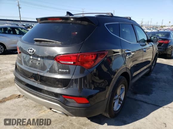 ✅ 2018 Hyundai Santa Fe 2.4L • VIN: 5NMZU3LB1JH058100 • Лот: 36433613. Опубликован ранее на Copart с пробегом 55 833 миль. Бесплатный доступ к архиву аукционных продаж из США и подробный отчёт об истории автомобиля на DreamBid. Изображение 3.
