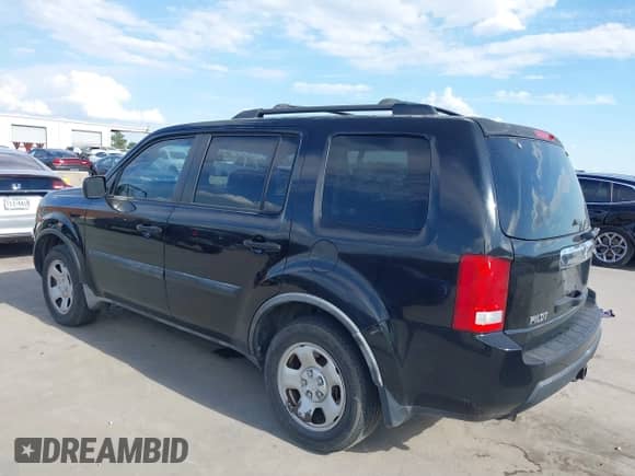 2009 Honda Pilot LX with VIN 5FNYF38239B004504, listed as a IAAI auction lot 43382186 with 218,342 mi miles and . Bid and sale history available at DreamBid. Image 3.