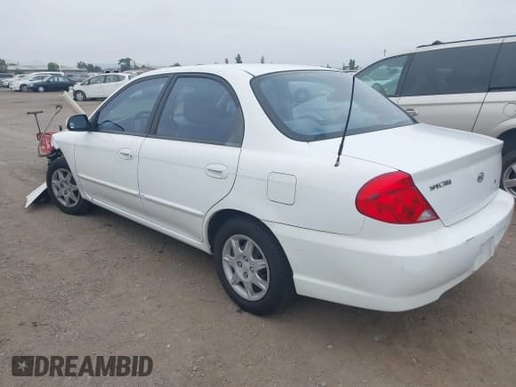 ✅ 2002 Kia Spectra • VIN: KNAFB121725173856 • Лот: 42609686. Опубликован ранее на IAAI с пробегом 160 894 миль. Бесплатный доступ к архиву аукционных продаж из США и подробный отчёт об истории автомобиля на DreamBid. Изображение 3.