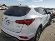 ✅ 2018 Hyundai Santa Fe 2.4L • VIN: 5NMZTDLB4JH083792 • Лот: 62271733. Опубликован ранее на Copart с пробегом Не указан. Бесплатный доступ к архиву аукционных продаж из США и подробный отчёт об истории автомобиля на DreamBid. Изображение 3.
