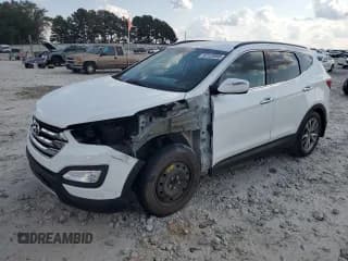 ✅ 2014 Hyundai Santa Fe • VIN: 5XYZU3LA5EG142735 • Лот: 82120895. Опубликован ранее на Copart с пробегом 163 141 миль. Бесплатный доступ к архиву аукционных продаж из США и подробный отчёт об истории автомобиля на DreamBid. Изображение 1.