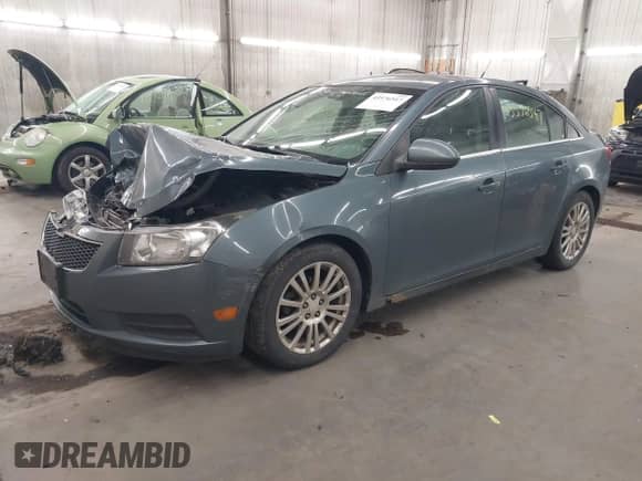 2012 Chevrolet Cruze ECO z VIN 1G1PJ5SC9C7247585, wystawiony jako IAAI lot #43576547 z przebiegiem 245 924 mil mil oraz . Historia ofert i sprzedaży dostępna na DreamBid. Obrazek 2.