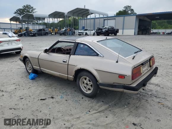 ✅ 1983 Datsun 280ZX 2+2 • VIN: JN1HZ06S1DX500976 • Lot: 56716405. Listed on Copart with 190,889 mi. Free auction sales archive from the USA and detailed vehicle history report at DreamBid. Image 2.