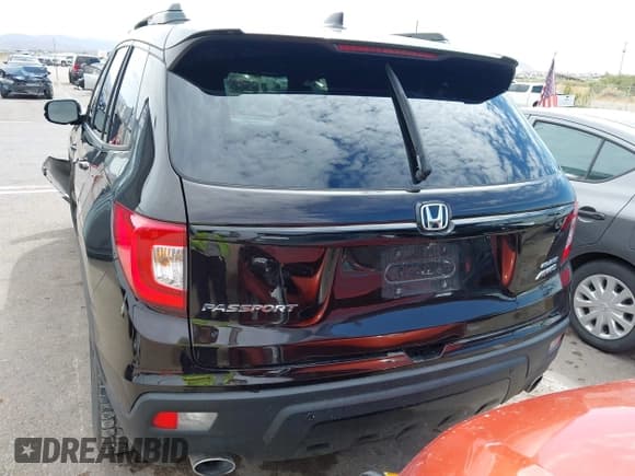 ✅ 2020 Honda Passport Elite • VIN: 5FNYF8H00LB003152 • Lot: 43236775. Listed on IAAI with 63,303 mi. Free auction sales archive from the USA and detailed vehicle history report at DreamBid. Image 16.