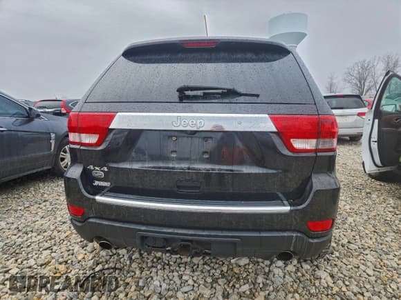 ✅ 2012 Jeep Grand Cherokee Overland • VIN: 1C4RJFCT4CC111702 • Лот: 93474915. Опубликован ранее на Copart с пробегом 116 970 миль. Бесплатный доступ к архиву аукционных продаж из США и подробный отчёт об истории автомобиля на DreamBid. Изображение 6.