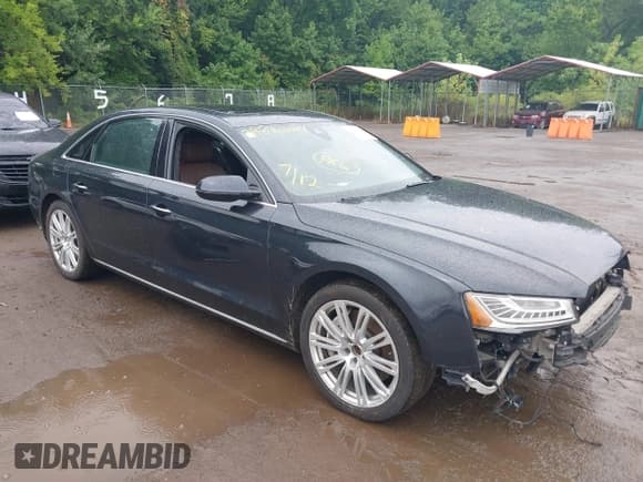 ✅ 2015 Audi A8 3.0T • VIN: WAU3GAFD9FN001343 • Lot: 39846084. Listed on IAAI with 105,242 mi. Free auction sales archive from the USA and detailed vehicle history report at DreamBid. Image 1.