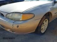 ✅ 1998 Ford Escort LX • VIN: 1FAFP10P3WW234833 • Lot: 42316400. Wystawiony na IAAI z przebiegiem 79 470 mil. Bezpłatny archiwum sprzedaży aukcyjnych z USA i szczegółowy raport historii pojazdu na DreamBid. Zdjęcie 16.