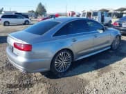 ✅ 2016 Audi A6 Premium Plus • VIN: WAUFMAFC6GN013402 • Лот: 41445514. Опубликован ранее на IAAI с пробегом 57 484 миль. Бесплатный доступ к архиву аукционных продаж из США и подробный отчёт об истории автомобиля на DreamBid. Изображение 4.