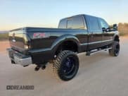 ✅ 2015 Ford F-250 Lariat • VIN: 1FT7W2BT9FEC80321 • Lot: 62563965. Listed on Copart with 128,581 mi. Free auction sales archive from the USA and detailed vehicle history report at DreamBid. Image 4.