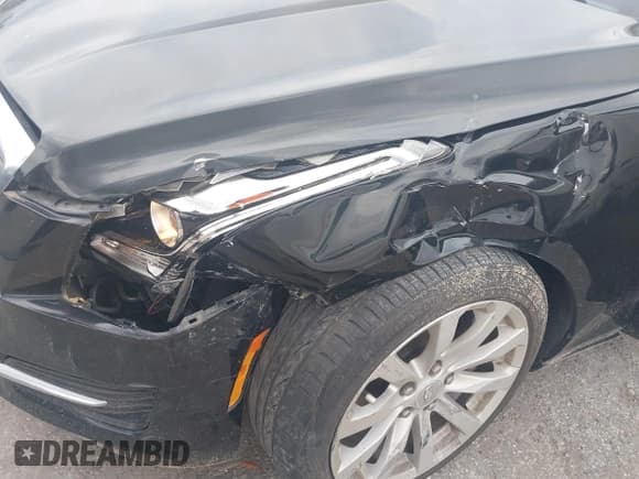 ✅ 2017 Cadillac ATS RWD • VIN: 1G6AA5RX1H0155721 • Lot: 42152475. Wystawiony na IAAI z przebiegiem 69 410 mil. Bezpłatny archiwum sprzedaży aukcyjnych z USA i szczegółowy raport historii pojazdu na DreamBid. Zdjęcie 6.